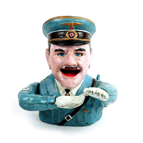 173 - A cast iron novelty money box in the form of a saluting Adolf Hitler, 15cm high.