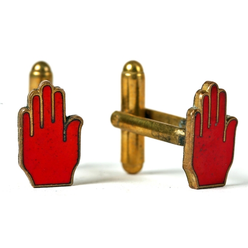 232 - Ulster Volunteer Force, a pair of enamelled, brass Red Hand cufflinks.