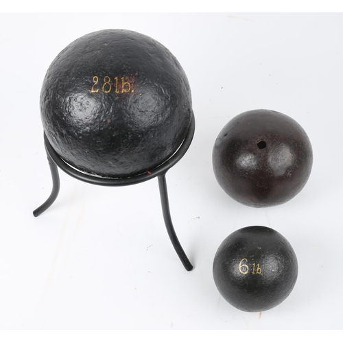 362 - Cannon balls. Three various cannon balls, a 28lb cannon ball on stand, a 6lb ball and a hollow canno... 