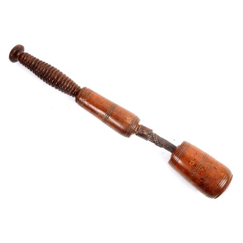 373 - Victorian yew-wood cosh. A hinged club, the two sections with nickel steel ferrules at the leather h... 