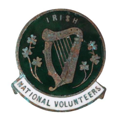 79 - Irish National Volunteers badge. A brass and enamel buttonhole badge, a harp flanked by sprays of sh... 