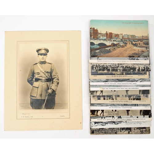 89 - Portrait photograph of an Irish Volunteer officer; together with fourteen1916 postcards, five by Val... 