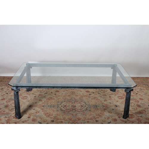 77 - AN ALFRANK COFFEE TABLE of rectangular outline surmounted by a glazed top with canted angles on rect... 