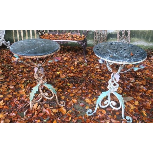 800 - A PAIR OF WROUGHT IRON AND MARBLE TABLES each with a circular green veined marble top above a spiral... 