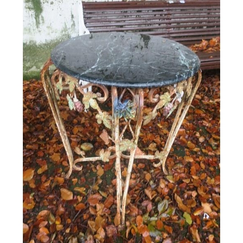 804 - A WROUGHT IRON AND MARBLE TABLE of circular outline surmounted by a green veined marble top with scr... 