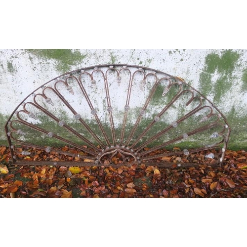 807 - A 19TH CENTURY CAST IRON FAN LIGHT of demi lune outline with pierce scroll stretchers and knopped fi... 