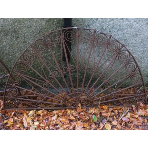 818 - A 19TH CENTURY WROUGHT IRON FAN LIGHT of demi lune outline with scroll decoration 
80cm (h) x 143cm ... 