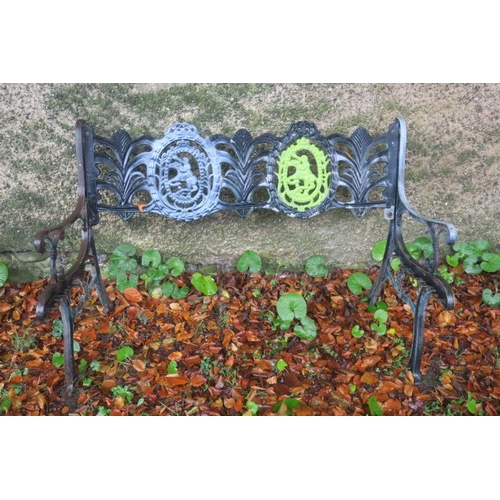 827 - A CAST METAL GARDEN BENCH with cameo and stylised foliate back and scroll arms 
lacking slats (AF)
1... 