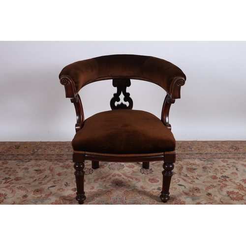 485 - A 19TH CENTURY MAHOGANY AND UPHOLSTERED TUB SHAPED ELBOW CHAIR the shaped back with pierced carved a... 