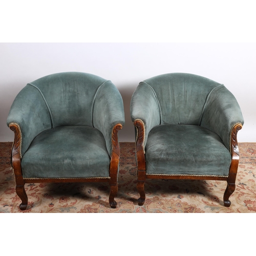 24 - A PAIR OF EDWARDIAN CARVED MAHOGANY AND UPHOLSTERED TUB SHAPED CHAIRS on cabriole legs