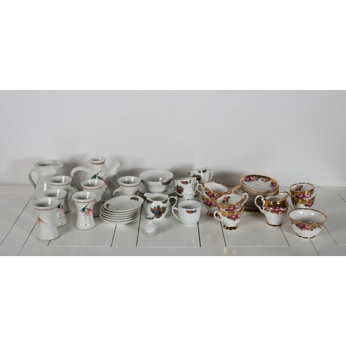 542 - A TWENTY PIECE ROYAL TUSCAN BONE CHINA TEASET, a part Victoria twenty piece teaset, an eight piece g... 