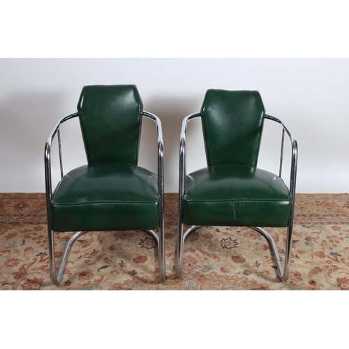 66 - A PAIR OF VINTAGE CHROME AND GREEN  UPHOLSTERED ELBOW CHAIRS each with a shaped upholstered back and... 