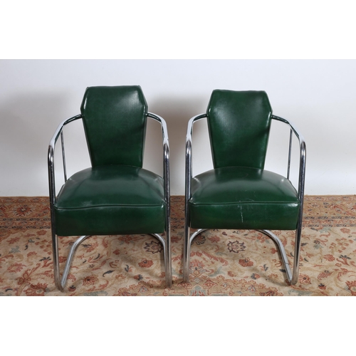 67 - A PAIR OF VINTAGE CHROME AND GREEN  UPHOLSTERED ELBOW CHAIRS each with a shaped upholstered back and... 