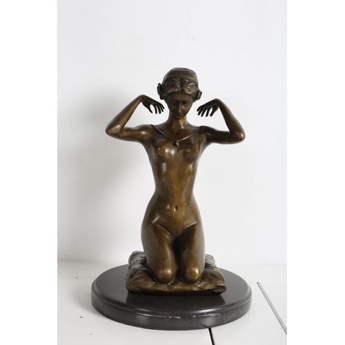 727 - after PAUL PONSARD
AN ART NOUVEAU DESIGN BRONZE FIGURE modelled as a female shown kneeling on a cush... 