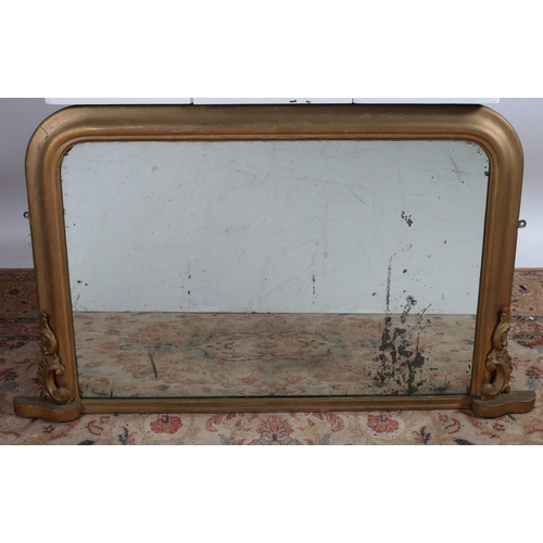 740 - A 19TH CENTURY GILTWOOD AND GESSO OVERMANTLE MIRROR the rectangular arched plate within a moulded fr... 