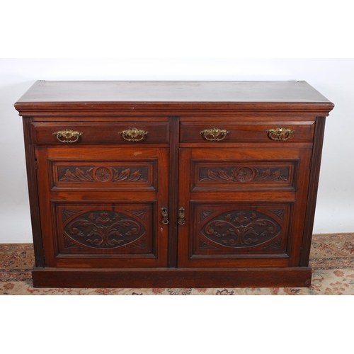 822 - AN EDWARDIAN CARVED MAHOGANY SIDEBOARD OF RECTANGULAR OUTLINE THE SHAPED TOP WITH  TWO FRIESE DRAWER... 