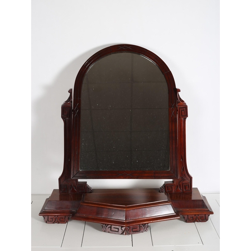 231 - A LATE 19TH CENTURY MAHOGANY CRUTCH FRAME MIRROR the rectangular plate within a moulded framed raise... 