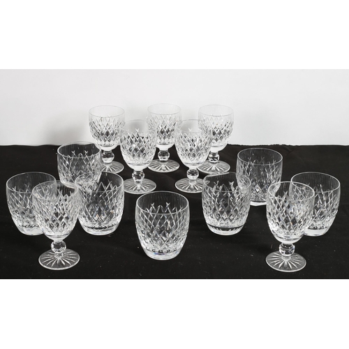 240 - A SET OF SEVEN WATERFORD CUT GLASS TUMBLERS together with a set of seven Waterford cut glass wine go... 