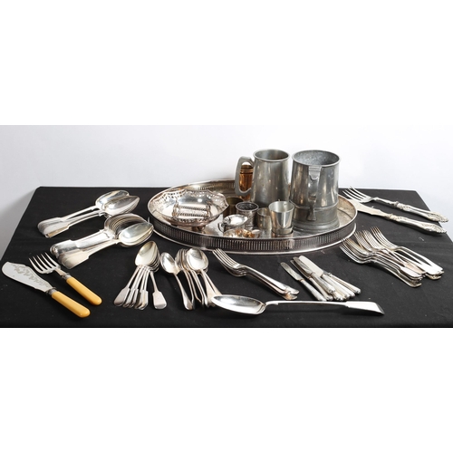 245 - A COLLECTION OF CUTLERY together with two pewter tankards, serviette rings, an oval plated serving t... 