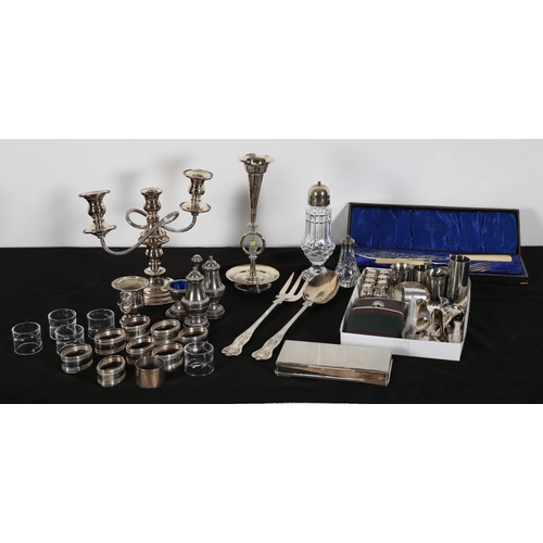 70 - A COLLECTION OF PLATED WARE to include a plated on copper three branch candelabra, a set of eight si... 