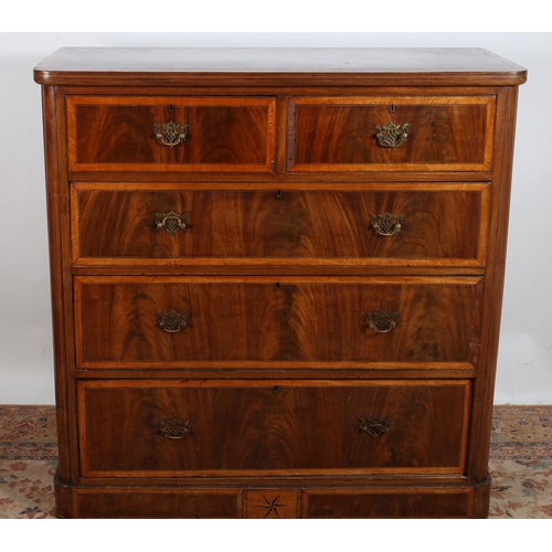 75 - A SHERATON DESIGN MAHOGANY AND SATINWOOD CROSSBANDED CHEST of rectangular outline the shaped top abo... 