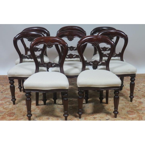 825 - A SET OF EIGHT VICTORIAN DESIGN MAHOGANY DINING ROOM CHAIRS each with a curved top rail and carved s... 