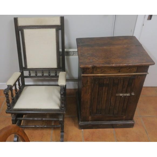 828 - A VINTAGE MAHOGANY AND UPHOLSTERED ROCKING CHAIR together with a hardwood side cabinet with a panel ... 