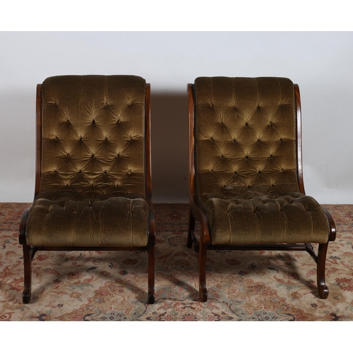 86 - A PAIR OF 19TH CENTURY MAHOGANY AND UPHOLSTERED NURSING CHAIRS each with a deep buttoned upholstered... 