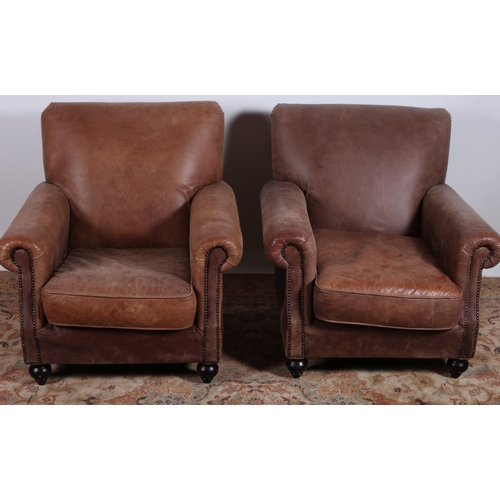 89 - A PAIR OF BROWN HIDE UPHOLSTERED ARM CHAIRS each with a rectangular back and scroll over arms with l... 