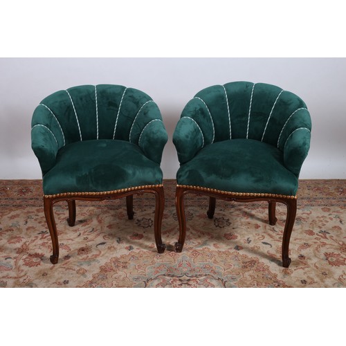 236 - A PAIR OF MAHOGANY AND UPHOLSTERED TUB SHAPED CHAIRS with upholstered back and seat on cabriole legs... 