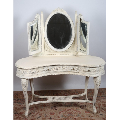 764 - A CONTINENTAL CREAM PAINTED AND PARCEL GILT DRESSING TABLE the superstructure with bevelled glass mi... 