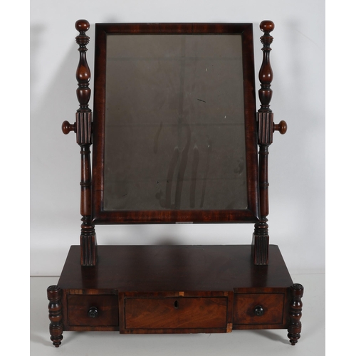 317 - A 19TH CENTURY MAHOGANY CRUTCH FRAME MIRROR the rectangular plate within a moulded frame raised on b... 