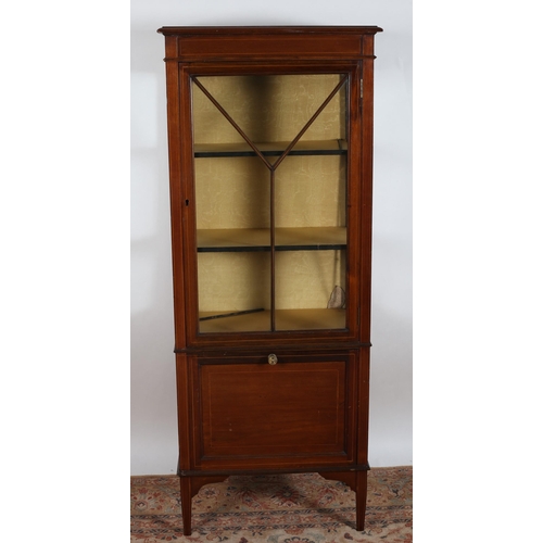 5 - A VINTAGE MAHOGANY DISPLAY CABINET of rectangular outline with astragal glazed door the base with hi... 