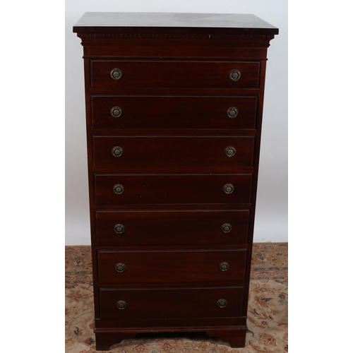 548 - A GEORGIAN DESIGN MAHOGANY TALLBOY of rectangular outline the shaped top above seven long graduated ... 