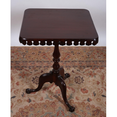 557 - A 19TH CENTURY MAHOGANY SNAP TOP OCCASIONAL TABLE of rectangular outline with pierced carved rim abo... 