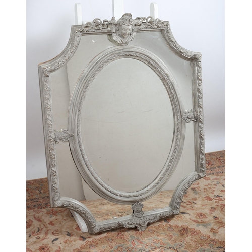 560 - A CONTINENTAL GREY PAINTED COMPARTMENTED MIRROR the oval bevelled glass plate within a moulded frame... 