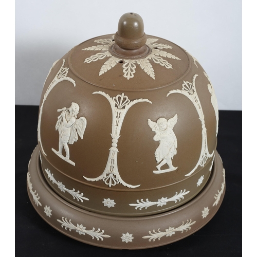 581 - AN ADAMS AND BROMLEY CHEESE DISH AND COVER the brown and bisque ground decorated with musical cherub... 