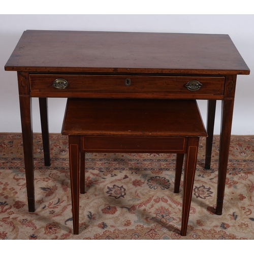 738 - A GEORGIAN MAHOGANY TABLE of rectangular outline with frieze drawer and brass drop handles on square... 