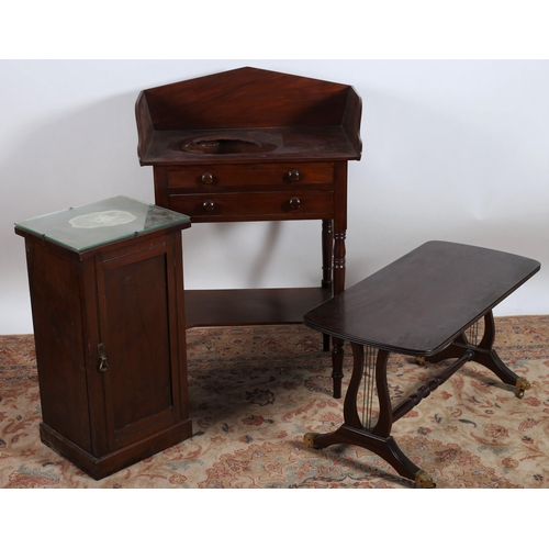 741 - A 19TH CENTURY MAHOGANY WASHSTAND the moulded three quarter gallery above a mock drawer and one true... 