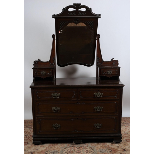 752 - AN EDWARDIAN MAHOGANY DRESSING TABLE the superstructure with bevelled glass mirror flanked by two sh... 