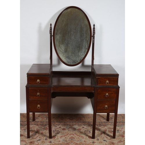 8 - A HEPPLEWHITE DESIGN MAHOGANY DRESSING TABLE the superstructure with bevelled glass swivel mirrors a... 