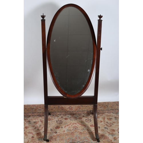 95 - A 19TH CENTURY MAHOGANY CHEVAL MIRROR the oval plate within a moulded frame raised on square moulded... 