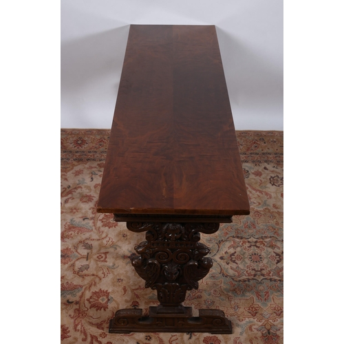 97 - A GOTHIC DESIGN WALNUT AND MAHOGANY SIDE TABLE of rectangular outline with gadrooned frieze on stand... 