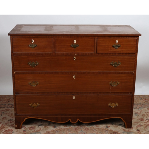 109 - A GEORGIAN MAHOGANY CHEST of rectangular outline the shaped top above three short drawers and three ... 