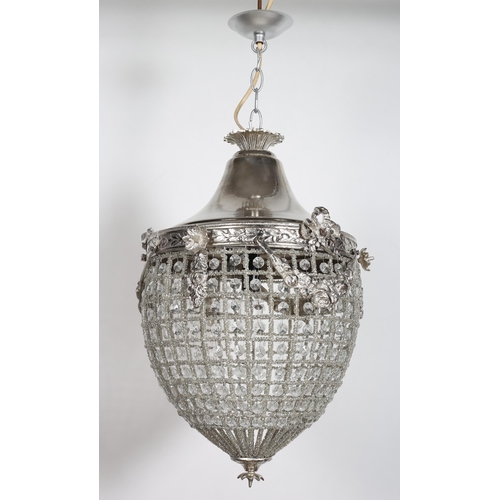 836 - A CONTINENTAL SILVERED AND CUT GLASS CENTRE LIGHT of ovoid tapering form inset with faceted pendants... 