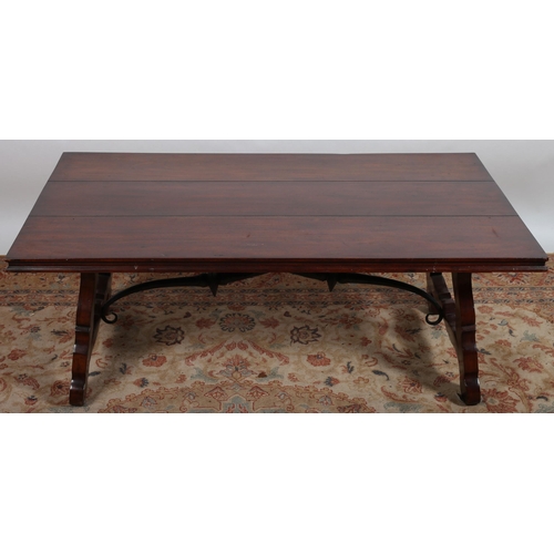 360 - A CONTINENTAL DESIGN MAHOGANY COFFEE TABLE of rectangular outline the shaped top on moulded splayed ... 