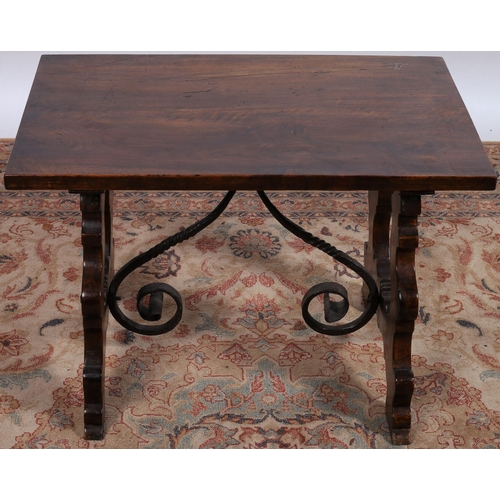 362 - A CONTINENTAL DESIGN MAHOGANY COFFEE TABLE of rectangular outline the shaped top raised on end stand... 