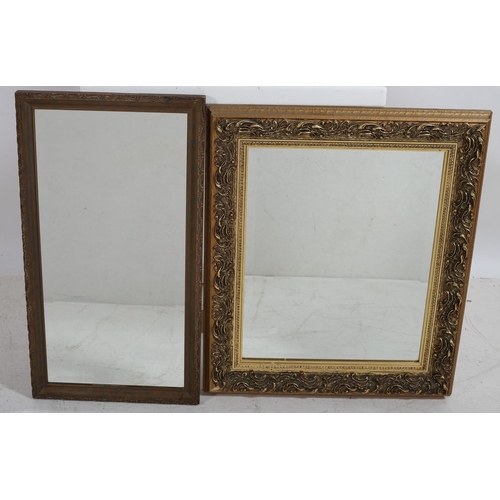 44 - TWO GILT FRAME MIRRORS each of rectangular outline with beveled glass plates 
The larger 67cm (h) x ... 
