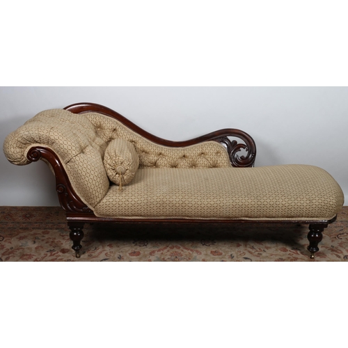 51 - A 19TH CENTURY MAHOGANY AND UPHOLSTERED CHAISE LONGUE the shaped top rail with button upholstered pa... 