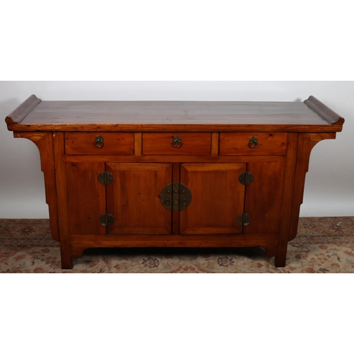 52 - AN ORIENTAL HARDWOOD SIDE CABINET the rectangular shaped top above three frieze drawers and cupboard... 